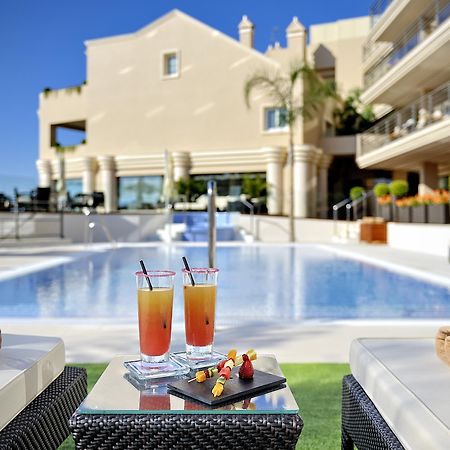 Vincci Seleccion Aleysa Hotel Benalmádena Kültér fotó The pool at the hotel